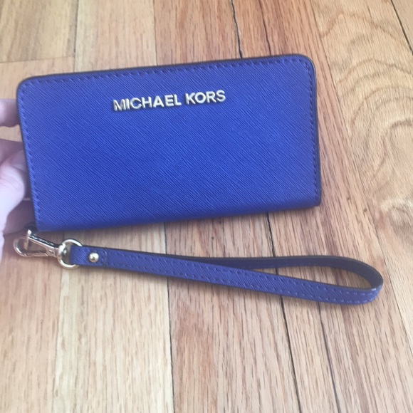 Michael Kors Handbags - Used Once! Michael Kors Slim Tech Wallet!